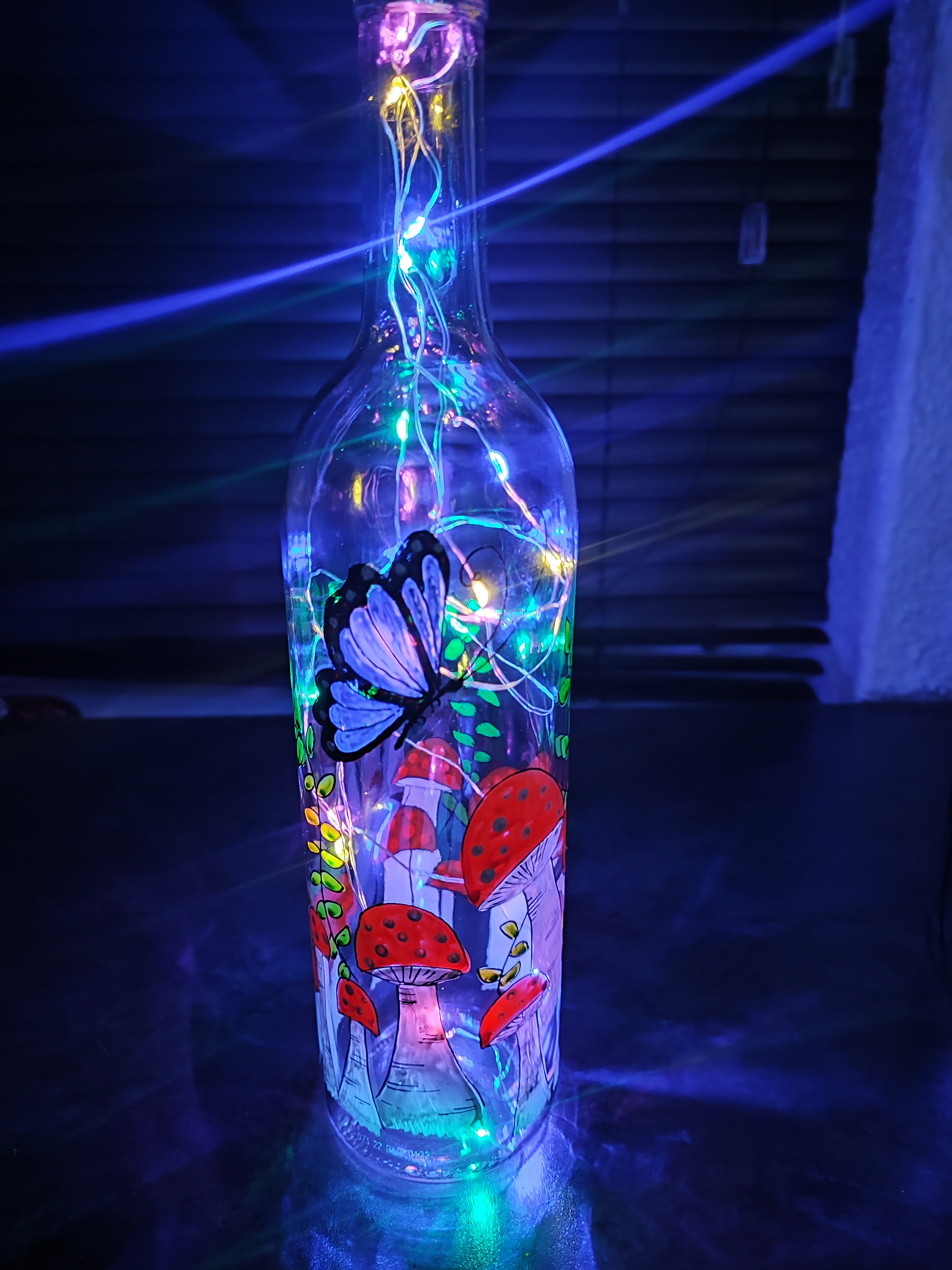Fairy light bottle with mushrooms